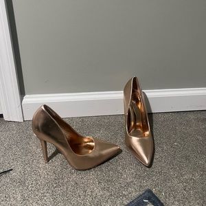 Rose gold pointed toe pumps